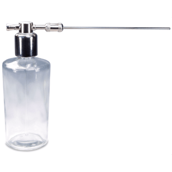 A clear bottle with a metal pump and a plastic tube.